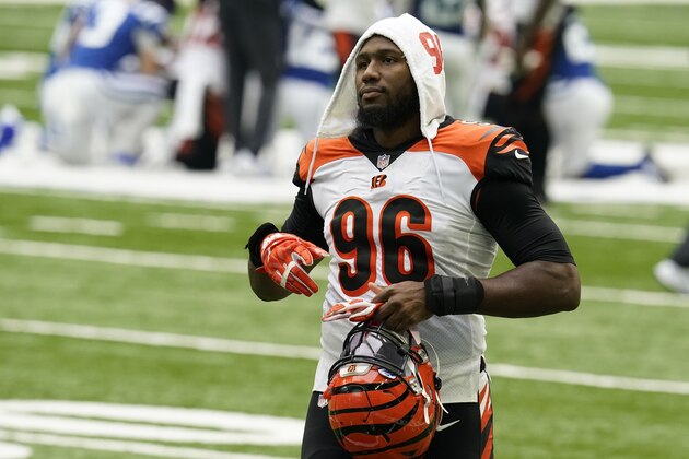 Cincinnati Bengals' Carlos Dunlap (96) walks off the field following an NFL football game against the Indianapolis Colts, Sunday, Oct. 18, 2020, in Indianapolis. (AP Photo/Michael Conroy)