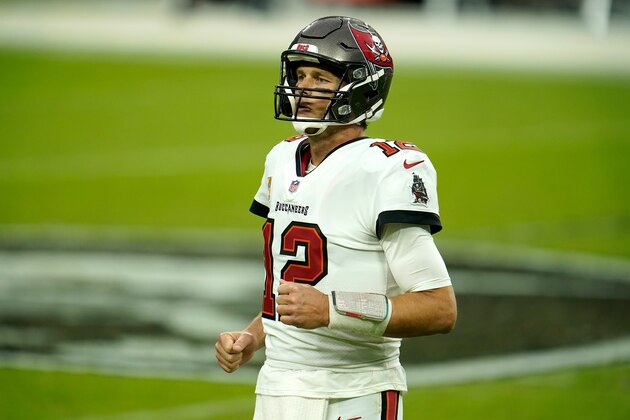 Tampa Bay Buccaneers quarterback Tom Brady (12) runs off the field against the Las Vegas Raiders during the second half of an NFL football game, Sunday, Oct. 25, 2020, in Las Vegas. (AP Photo/Jeff Bottari)