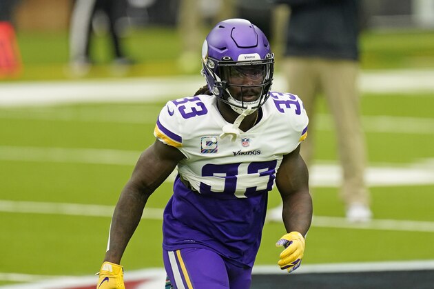 Minnesota Vikings' Dalvin Cook (33) warms up before an NFL football game against the Houston Texans Sunday, Oct. 4, 2020, in Houston. (AP Photo/David J. Phillip)