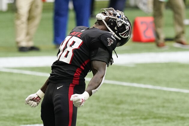 Atlanta Falcons defensive end Takkarist McKinley (98) celebrates a sack on Seattle Seahawks quarterback Russell Wilson during the first half of an NFL football game, Sunday, Sept. 13, 2020, in Atlanta. (AP Photo/Brynn Anderson) Atlanta Falcons defensive end Takkarist McKinley (98) celebrates a sack on Seattle Seahawks quarterback Russell Wilson during the first half of an NFL football game, Sunday, Sept. 13, 2020, in Atlanta. (AP Photo/Brynn Anderson)