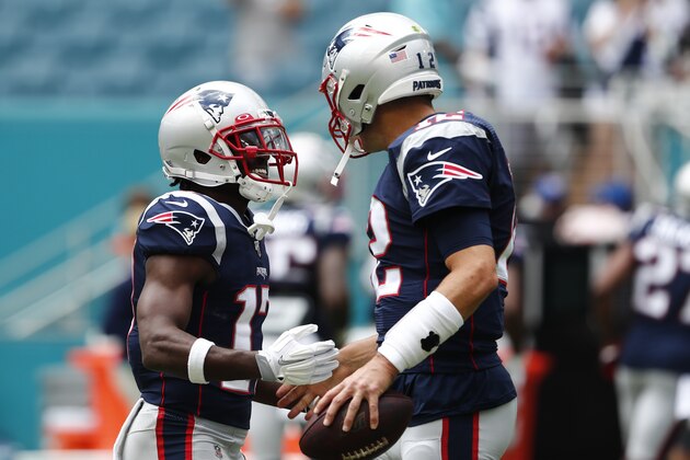 New England Patriots quarterback Tom Brady (12) greets wide receiver Antonio Brown (17) before the start of an NFL football game against the Miami Dolphins, Sunday, Sept. 15, 2019, in Miami Gardens, Fla. (AP Photo/Brynn Anderson) New England Patriots quarterback Tom Brady (12) greets wide receiver Antonio Brown (17) before the start of an NFL football game against the Miami Dolphins, Sunday, Sept. 15, 2019, in Miami Gardens, Fla. (AP Photo/Brynn Anderson)