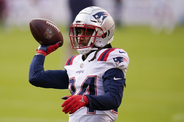 New England Patriots cornerback Stephon Gilmore warms up before an NFL football game against the Kansas City Chiefs, Monday, Oct. 5, 2020, in Kansas City. (AP Photo/Jeff Roberson)