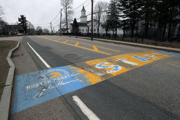 The Boston Marathon start line is vacant in Hopkinton, Mass., Monday, April 20, 2020. Due to the coronavirus outbreak, the 124th Boston Marathon, which would have been run today, was postponed till Sept. 14. (AP Photo/Charles Krupa)