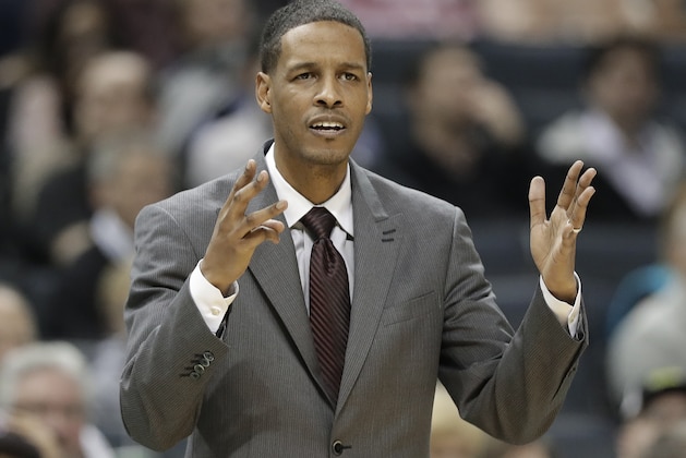 Charlotte Hornets associate head coach Stephen Silas argues a call during the second half of the team's NBA basketball game against the Toronto Raptors in Charlotte, N.C., Wednesday, Dec. 20, 2017. (AP Photo/Chuck Burton)