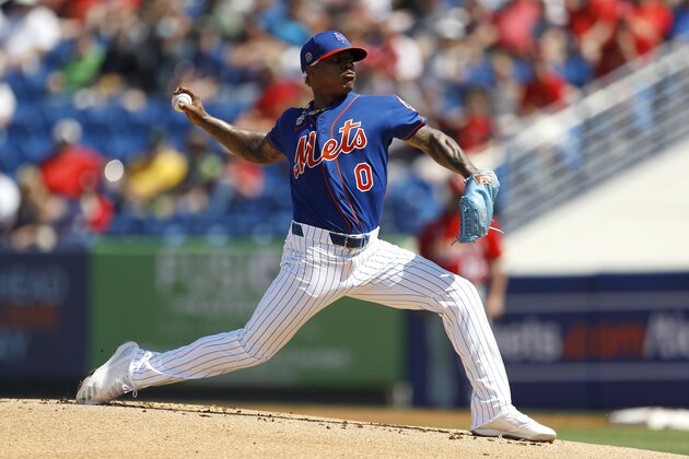 New York Mets pitcher Marcus Stroman throws a pitch to the St. Louis Cardinals during the first inning of a spring training baseball game, Wednesday, March 4, 2020, in Port St. Lucie, Fla. (AP Photo/Julio Cortez)