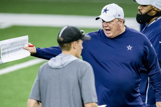 Dallas Cowboys head coach Mike McCarthy gives instructions to his players during an NFL football training camp practice at The Star, Friday, Aug. 28, 2020, in Frisco, Texas. (AP Photo/Brandon Wade)