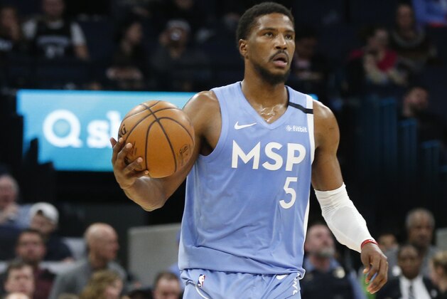 Minnesota Timberwolves' Malik Beasley plays against the Orlando Magic in an NBA basketball game, Friday, March 6, 2020 in Minneapolis. (AP Photo/Jim Mone)