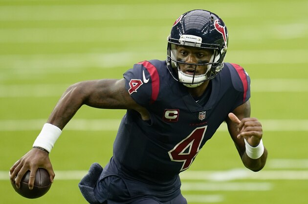 Houston Texans quarterback Deshaun Watson (4) carries the ball as he scrambles during an NFL football game against the Green Bay Packers, Sunday, Oct. 11, 2020, in Houston. (AP Photo/Matt Patterson)