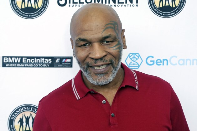 FILE - In this Aug. 2, 2019, file photo, Mike Tyson attends a celebrity golf tournament in Dana Point, Calif. Tyson and Roy Jones Jr. got permission from California's athletic commission to return to the boxing ring next month because their fight would be strictly an exhibition of their once-unparalleled skills. (Photo by Willy Sanjuan/Invision/AP, File)