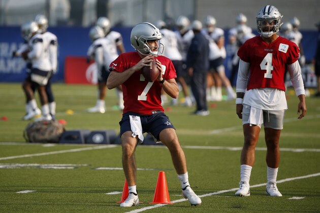 Dallas Cowboys quarterback Ben DiNucci (7) prepared to throw the ball as Dallas Cowboys quarterback Dak Prescott (4) watches, during an NFL football training camp in Frisco, Texas, Sunday, Sept. 16, 2020. (AP Photo/Michael Ainsworth)
