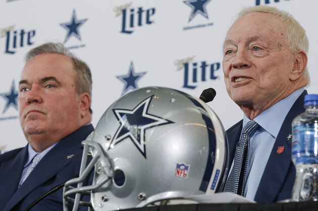 New Dallas Cowboys head coach Mike McCarthy, left, is introduced by team owner Jerry Jones, right, during a press conference at the Dallas Cowboys headquarters Wednesday, Jan. 8, 2020, in Frisco, Texas. (AP Photo/Brandon Wade)
