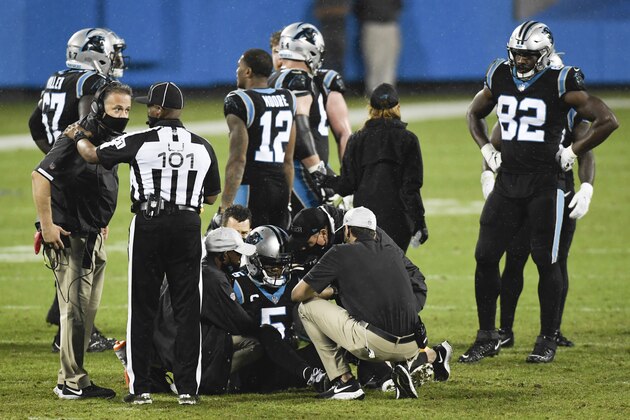 Carolina Panthers quarterback Teddy Bridgewater is treated on the field after being injured during the second of an NFL football game against the Atlanta Falcons Thursday, Oct. 29, 2020, in Charlotte, N.C.(AP Photo/Mike McCarn)