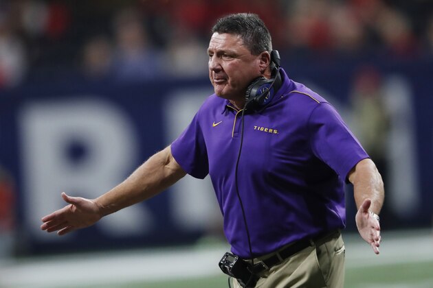 LSU head coach Ed Orgeron watches play against Georgia during the first half of the Southeastern Conference championship NCAA college football game, Saturday, Dec. 7, 2019, in Atlanta. (AP Photo/John Bazemore)