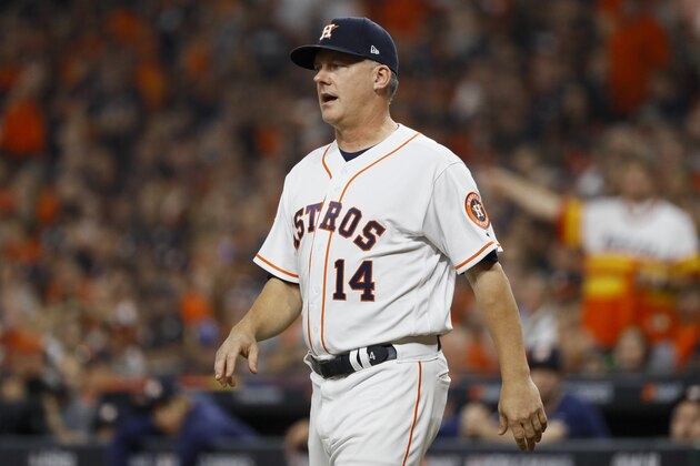 Houston Astros manager AJ Hinch protests a call during the fourth inning of Game 1 of the baseball World Series against the Washington Nationals Tuesday, Oct. 22, 2019, in Houston. (AP Photo/Matt Slocum)