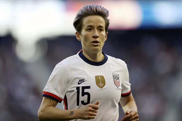 FILE - In this March 8, 2020, file photo, U.S. forward Megan Rapinoe runs during the second half of a SheBelieves Cup soccer match against Spain in Harrison, N.J. Rapinoe is among the athletes touting the benefits of CBD for pain management and recovery. CBD products have become big business after the 2018 Farm Bill made hemp a legal agricultural crop. CBD is found in both hemp and marijuana plants. It has been hailed as a health and wellness aid and infused in everything from gummies to lotions. Rapinoe's twin sister Rachael has helped launch a CBD products company called Mendi, which is geared toward athletes. (AP Photo/Steve Luciano, File)