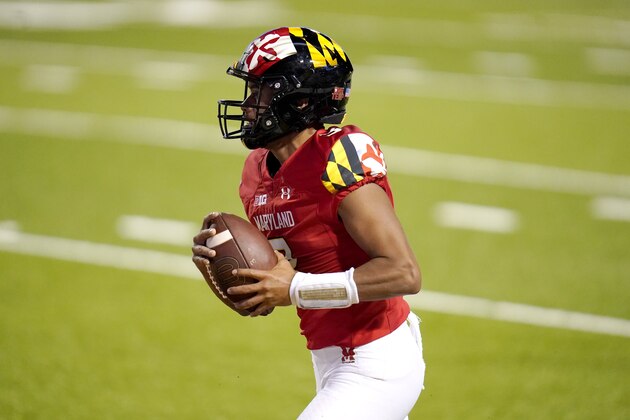 Maryland quarterback Taulia Tagovailoa runs for a touchdown against Minnesota during the first half of an NCAA college football game, Friday, Oct. 30, 2020, in College Park, Md. (AP Photo/Julio Cortez) Maryland quarterback Taulia Tagovailoa runs for a touchdown against Minnesota during the first half of an NCAA college football game, Friday, Oct. 30, 2020, in College Park, Md. (AP Photo/Julio Cortez)