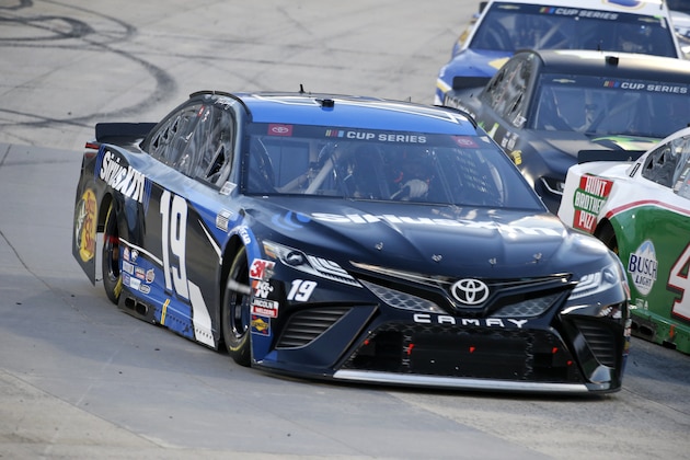 Martin Truex Jr. (19) drives during a NASCAR Cup Series auto race Wednesday, June 10, 2020, in Martinsville, Va. (AP Photo/Steve Helber) Martin Truex Jr. (19) drives during a NASCAR Cup Series auto race Wednesday, June 10, 2020, in Martinsville, Va. (AP Photo/Steve Helber)