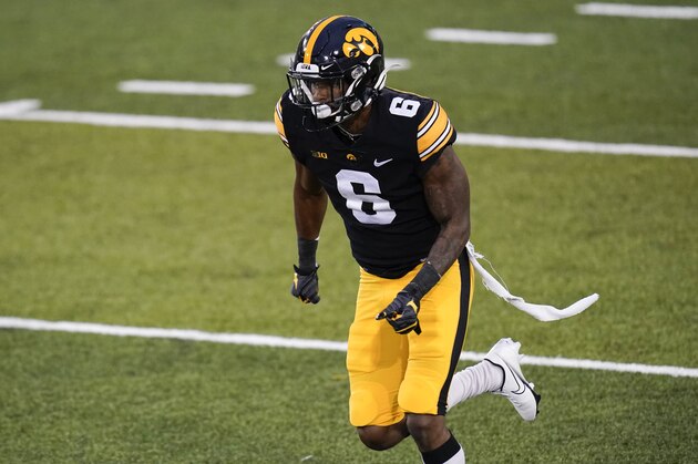 Iowa wide receiver Ihmir Smith-Marsette runs up field during the second half of an NCAA college football game against Northwestern, Saturday, Oct. 31, 2020, in Iowa City, Iowa. (AP Photo/Charlie Neibergall)