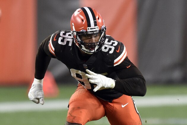 FILE - In this Sunday, Oct. 11, 2020, file photo, Cleveland Browns defensive end Myles Garrett (95) rushes the passer during an NFL football game against the Indianapolis Colts in Cleveland. On Sunday, Garrett will face his past and the Steelers for the first time since Nov. 14, when the Browns defensive end let his emotions overpower him and he ripped off the helmet of Pittsburgh's Mason Rudolph and bashed the quarterback over the head. (AP Photo/David Richard, File)