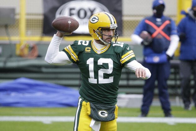 Green Bay Packers' Aaron Rodgers throws during the first half of an NFL football game against the Minnesota Vikings Sunday, Nov. 1, 2020, in Green Bay, Wis. (AP Photo/Mike Roemer)