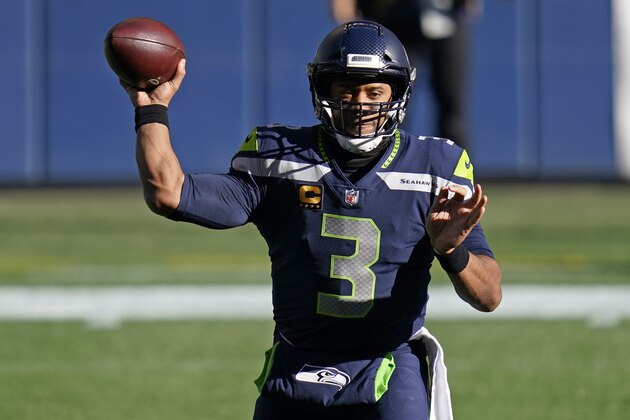 Seattle Seahawks quarterback Russell Wilson passes against the San Francisco 49ers during the first half of an NFL football game, Sunday, Nov. 1, 2020, in Seattle. (AP Photo/Elaine Thompson)