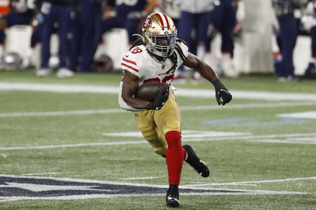 San Francisco 49ers running back JaMycal Hasty runs against the New England Patriots during an NFL football game at Gillette Stadium, Sunday, Oct. 25, 2020 in Foxborough, Mass. (Winslow Townson/AP Images for Panini)