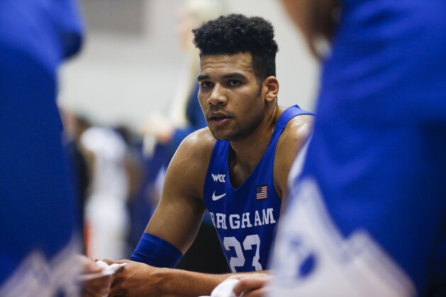 BYU forward Yoeli Childs (23) listens during an NCAA college basketball game between Pepperdine and BYU Saturday, Feb. 29, 2020, in Malibu, Calif. (AP Photo/Ringo H.W. Chiu)