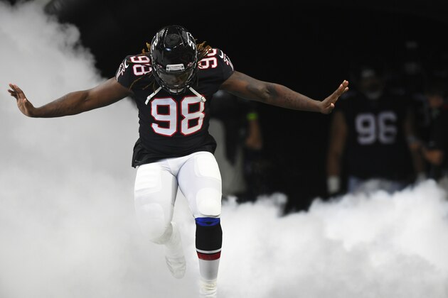 Atlanta Falcons defensive end Takkarist McKinley (98) enters the field before the first half of an NFL football game between the Atlanta Falcons and the Tennessee Titans, Sunday, Sept. 29, 2019, in Atlanta. (AP Photo/John Amis)
