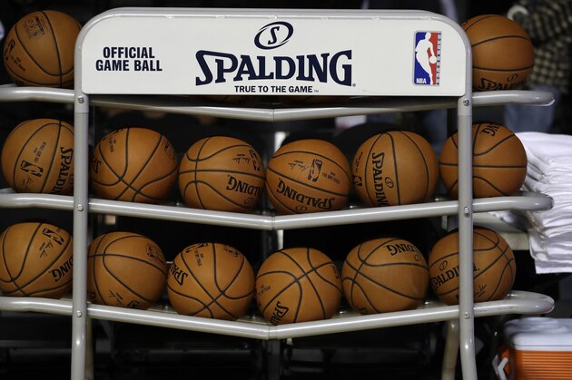 Basketballs sit in a rack on the court during a training session by the Brooklyn Nets at the Mexico City Arena in Mexico City, Wednesday, Dec. 6, 2017. The Brooklyn Nets will play two regular season games in Mexico City, facing the Oklahoma City Thunder on Thursday, and the Miami Heat on Saturday. (AP Photo/Rebecca Blackwell)