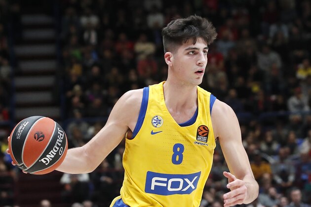 Maccabi Fox Tel Aviv's Deni Avdija controls the ball during the Euro League basketball match between Olimpia Milan and Maccabi Fox Tel Aviv, in Milan, Italy, Tuesday, Nov. 19, 2019. (AP Photo/Antonio Calanni)