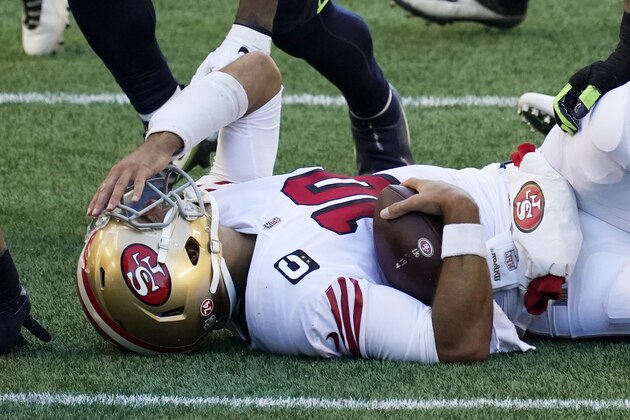 San Francisco 49ers quarterback Jimmy Garoppolo reacts after he was sacked by Seattle Seahawks middle linebacker Bobby Wagner during the first half of an NFL football game, Sunday, Nov. 1, 2020, in Seattle. (AP Photo/Elaine Thompson)