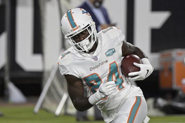 Miami Dolphins wide receiver Isaiah Ford warms up before an NFL football game against the Jacksonville Jaguars, Thursday, Sept. 24, 2020, in Jacksonville, Fla. (AP Photo/Phelan M. Ebenhack)