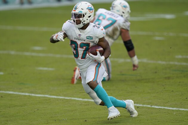 Miami Dolphins running back Myles Gaskin (37) runs the ball during the first half of an NFL football game against the New York Jets, Sunday, Oct. 18, 2020, in Miami Gardens, Fla. (AP Photo/Lynne Sladky)