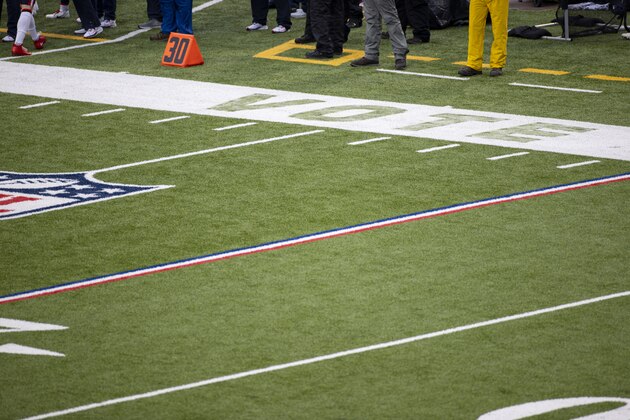 Detail view of a VOTE logo painted on the sideline during the third quarter of an NFL football game between the Buffalo Bills and the New England Patriots, Sunday, Nov. 1, 2020, in Orchard Park, N.Y. (AP Photo/Brett Carlsen)