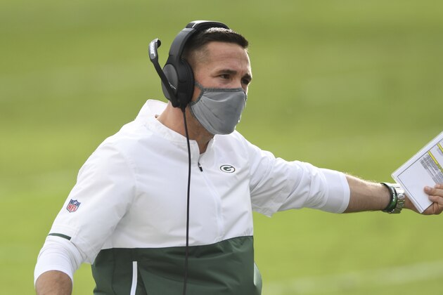 Green Bay Packers head coach Matt LaFleur gestures during the first half of an NFL football game against the Tampa Bay Buccaneers Sunday, Oct. 18, 2020, in Tampa, Fla. (AP Photo/Jason Behnken)
