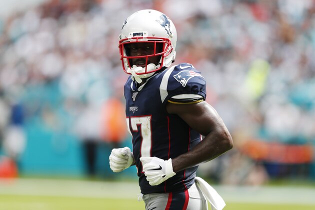 New England Patriots wide receiver Antonio Brown (17) runs back to the sidelines, during the second half at an NFL football game against the Miami Dolphins, Sunday, Sept. 15, 2019, in Miami Gardens, Fla. (AP Photo/Brynn Anderson)
