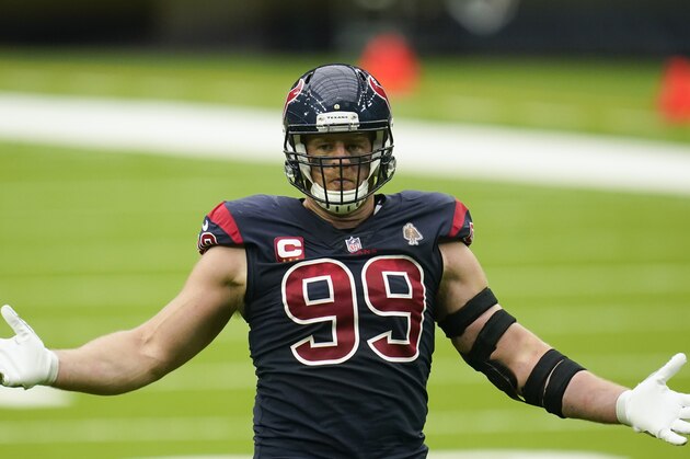 Houston Texans defensive end J.J. Watt (99) with arms outstretched between plays during an NFL football game against the Green Bay Packers, Sunday, Oct. 11, 2020, in Houston. (AP Photo/Matt Patterson)