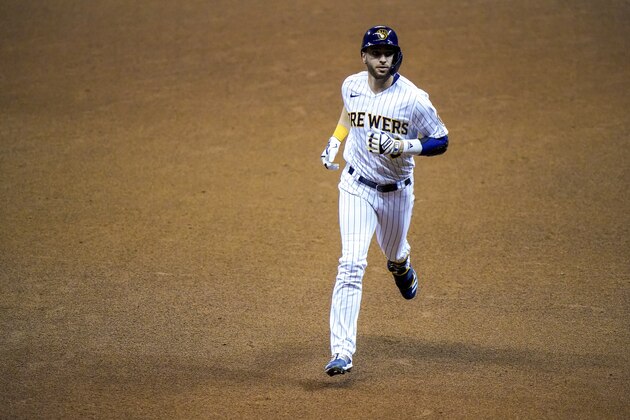 Milwaukee Brewers' Ryan Braun celebrates his two-run home run during the fourth inning of a baseball game against the Chicago Cubs Saturday, Sept. 12, 2020, in Milwaukee. (AP Photo/Morry Gash)