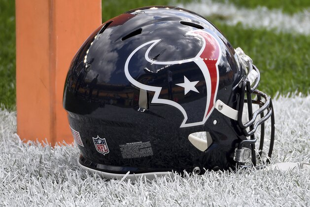 A Houston Texans helmet sits on the sidelines before an NFL football game against the Pittsburgh Steelers, Sunday, Sept. 27, 2020, in Pittsburgh. (AP Photo/Justin Berl)