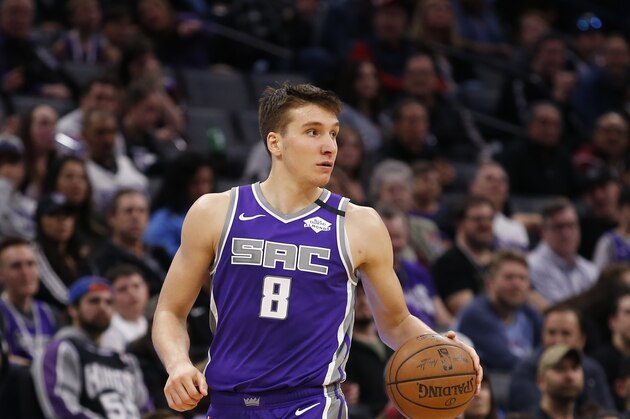 Sacramento Kings guard Bogdan Bogdanovic dribbles down court during the second half of an NBA basketball game against the Toronto Raptors in Sacramento, Calif., Sunday, March 8, 2020. The Raptors won 118-113. (AP Photo/Rich Pedroncelli)