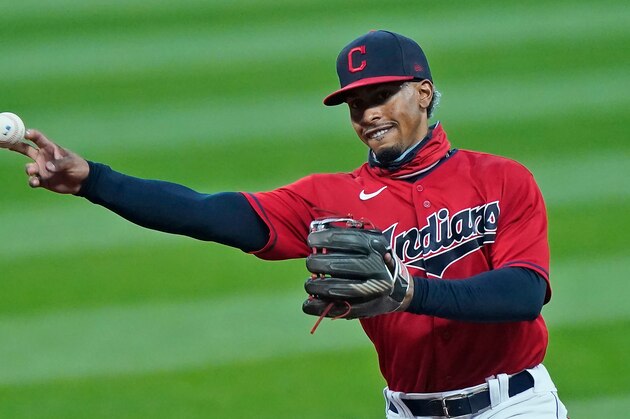 Cleveland Indians' Francisco Lindor throws out Kansas City Royals' Alex Gordon at first base in the sixth inning of a baseball game, Thursday, Sept. 10, 2020, in Cleveland. (AP Photo/Tony Dejak)
