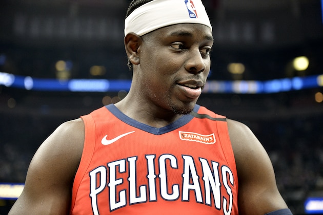 New Orleans Pelicans guard Jrue Holiday stands on the court in the first half of an NBA basketball game against the Memphis Grizzlies Monday, Jan. 20, 2020, in Memphis, Tenn. (AP Photo/Brandon Dill)