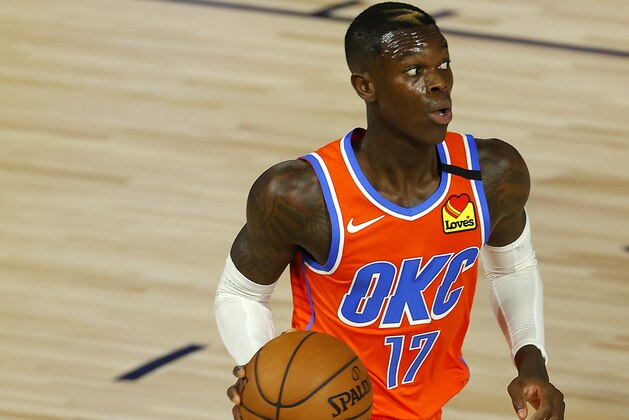 Oklahoma City Thunder's Dennis Schroder (17) handles the ball during the first half of an NBA basketball game against the Los Angeles Clippers Friday, Aug. 14, 2020, in Lake Buena Vista, Fla. (Mike Ehrmann/Pool Photo via AP)