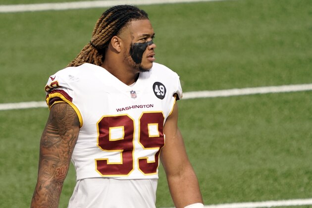 Washington Football Team defensive end Chase Young (99) warms up before an NFL football game against the New York Giants Sunday, Oct.18, 2020, in East Rutherford, N.J. The Giants won 20-19. (AP Photo/Bill Kostroun)