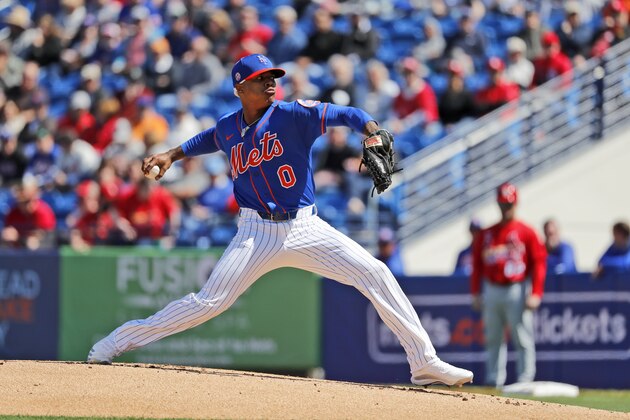 New York Mets pitcher Marcus Stroman throws during the first inning of a spring training baseball game against the St. Louis Cardinals Friday, Feb. 28, 2020, in Port St. Lucie, Fla. (AP Photo/Jeff Roberson)