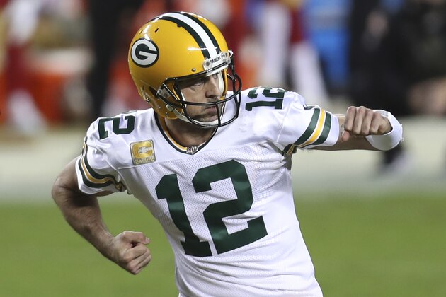Green Bay Packers quarterback Aaron Rodgers (12) celebrates after throwing a touchdown pass against the San Francisco 49ers during the first half of an NFL football game in Santa Clara, Calif., Thursday, Nov. 5, 2020. (AP Photo/Jed Jacobsohn)