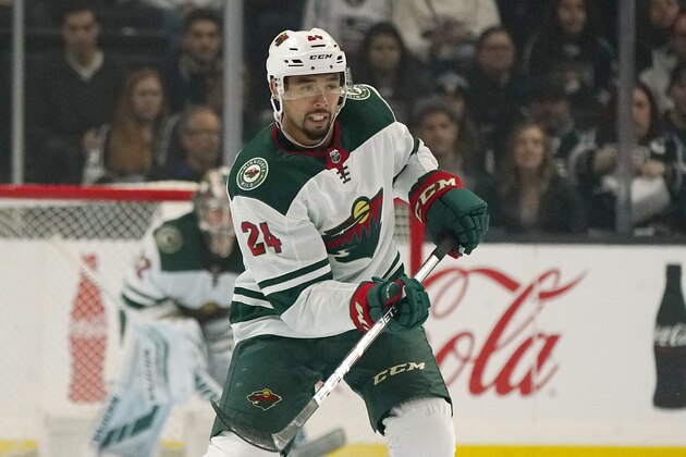 Minnesota Wild defenseman Matt Dumba passes the puck during the first period of an NHL hockey game against the Los Angeles Kings Saturday, March 7, 2020, in Los Angeles. (AP Photo/Mark J. Terrill)