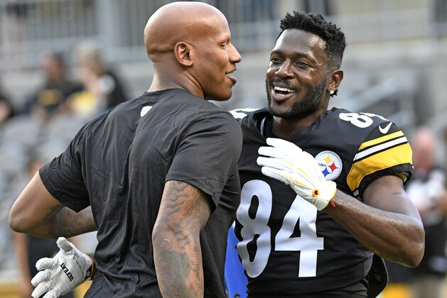 Pittsburgh Steelers wide receiver Antonio Brown (84) hugs injured linebacker Ryan Shazier during warm ups before a pre season NFL football game against the Carolina Panthers in Pittsburgh, Thursday, Aug. 30, 2018. (AP Photo/Don Wright)