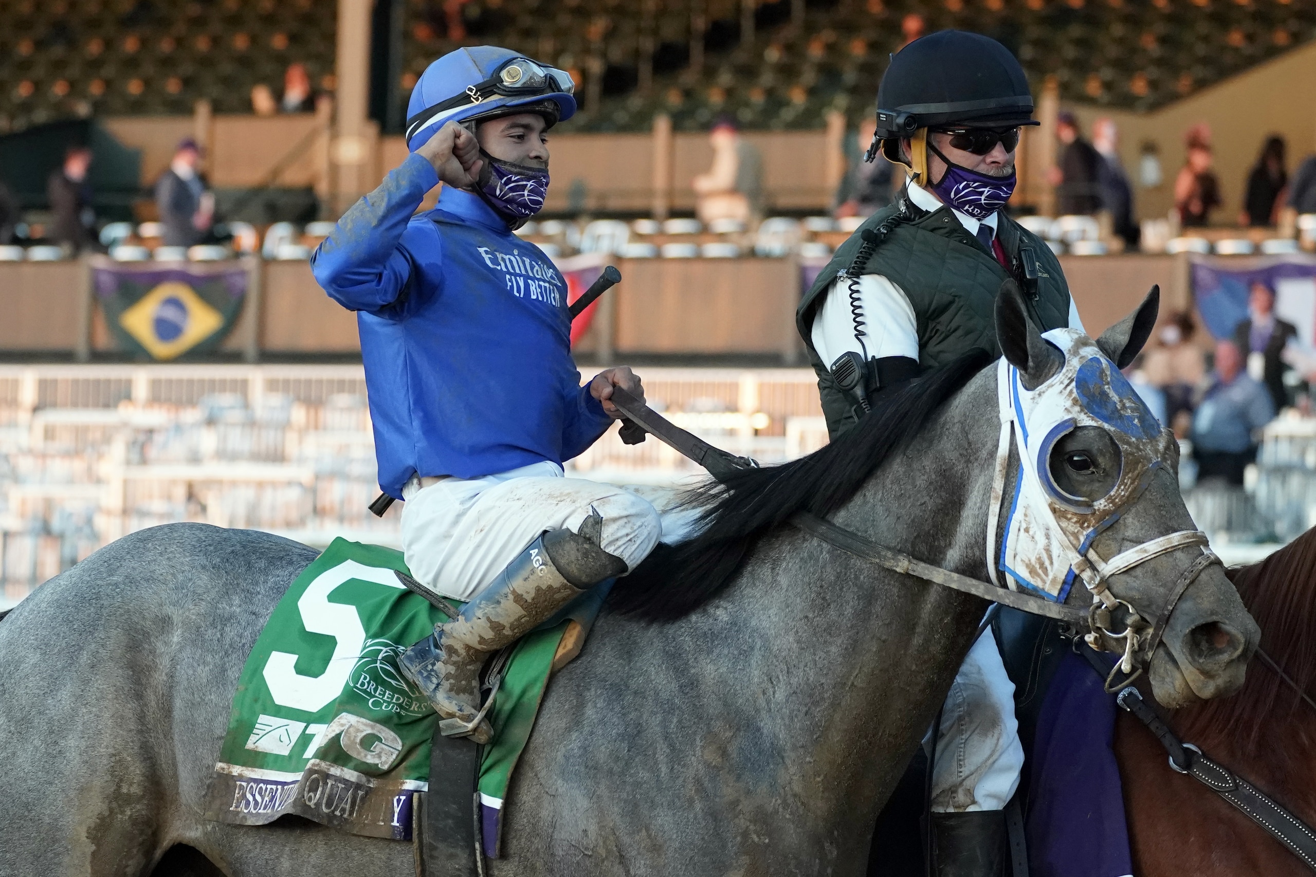 Jockey Luis Saez and Essential Quality are led to the winner's circle after winning the Breeders' Cup Juvenile horse race at Keeneland Race Course, Friday, Nov. 6, 2020, in Lexington, Ky. (AP Photo/Michael Conroy) Jockey Luis Saez and Essential Quality are led to the winner's circle after winning the Breeders' Cup Juvenile horse race at Keeneland Race Course, Friday, Nov. 6, 2020, in Lexington, Ky. (AP Photo/Michael Conroy)