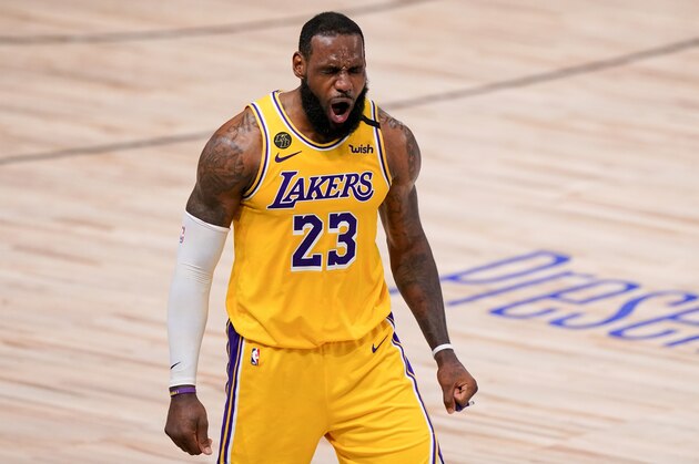 Los Angeles Lakers forward LeBron James plays against the Miami Heat during the second half in Game 4 of basketball's NBA Finals Tuesday, Oct. 6, 2020, in Lake Buena Vista, Fla. (AP Photo/Mark J. Terrill)